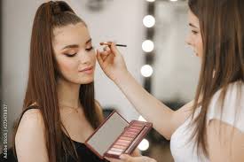 makeup artist work in her beauty studio