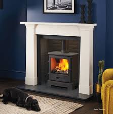 Find out how easy it is to paint and decorate a brick fireplace, what paint you should use and get some great ideas. Stone Fireplaces Fireplace Stone Surrounds London Wimbledon Enviro Flame