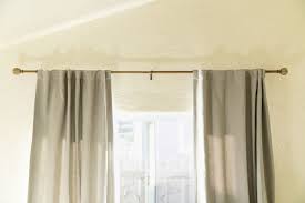 how to hang curtains like a designer