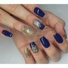 navy blue and gold glitter nails by