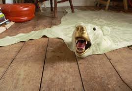 kitchy faux bear skin rugs are perfect