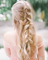 She can go for the much adorned half down look or the simple loose open hairstyle. Gorgeous Ways To Wear Your Hair Down For Your Wedding