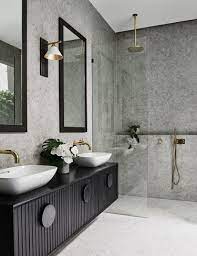 10 Stunning Stone Tile Bathroom Designs