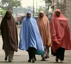 Image result for Muslim lady clothing coming into contact with impurities