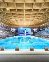 The paris 2024 olympics organizing committee will attempt a world record on sunday when they will unfurl from the eiffel tower and fly what they hope will be the biggest flag ever flown, as part of the. 2024 Paris Olympics Aquatic Center Mad Architects Archello