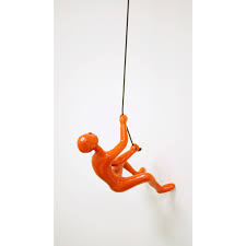 This unique wall sculpture creates the illusion of a man climbing the rope or any surface he is hung on. Climbing Man Wall Art 3x3x6 Orange Overstock 16814480