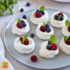 I added 1 tsp vanilla and 1 t powdered sugar to the cream. Mini Pavlova Recipe With Fresh Berries Sunday Supper Movement