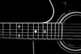 black and white acoustic guitar