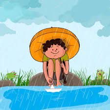 cute boy in rains for monsoon season