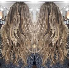 The haircut has layers that lengthen from the back towards the front. 28 Long Dark Blonde Hairstyles Blonde Hairstyles 2020