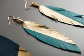 Check out our diy feather earrings selection for the very best in unique or custom, handmade pieces from our shops. How To Make Gold Dipped Leather Feather Earrings Brit Co