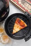 How do you cook leftover pizza in an air fryer?