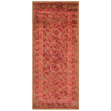 antique axminster rug at