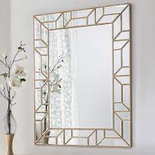 The outer frame is matte black iron for an industrial feel. Wall Mirror Verbier Rectangle Gold Finish Select Mirrors