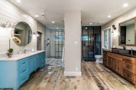 Adopting pendant lighting over the bathtub with classy furniture pieces, this master bathroom is one of a kind. His And Her Luxury Master Bathroom Remodel Southern Materials Bathroom Remodel