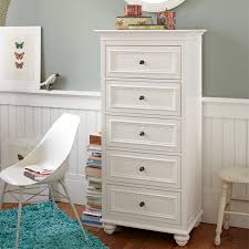The contemporary lines are softened by the curved kick plate, and metal handles add character and value to the furniture. Tall Dresser For Bedroom