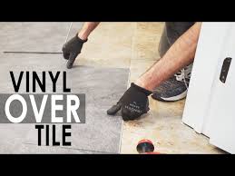install vinyl or laminate flooring over