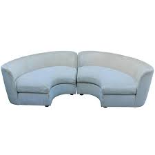 pair of curved semi circular sofas by