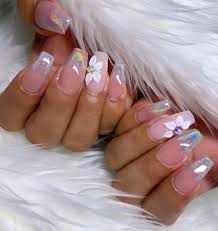 For those of us who work with money, children, or the elderly, shorter nails are optimal. Short Coffin Nails With Holo Fade And White Acrylic Flower With A Crystal Nails
