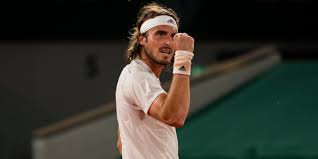 Tsitsipas gets agitated by the length of the delay. I1850vcxjntlym