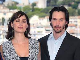 Keanu Reeves and Carrie-Anne Moss ...