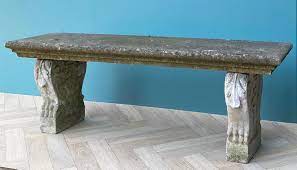 a large reclaimed stone garden bench