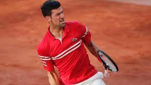 Serbian novak djokovic smashed an overhead return onto the clay court to win match point in a marathon french open men's final against greece's stefanos tsitsipas to capture his 19th career major. Pskaw1jusv9hmm