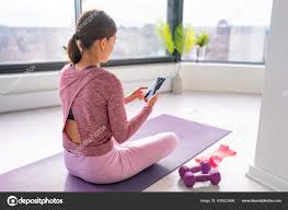woman watching fitness videos