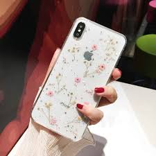 The clear case isn't quite clear this year, which might not be everyone's cup of tea. Amazon Com Shinymore Iphone Xr Flower Case Soft Clear Flexible Rubber Pressed Dry Real Flowers Case Girls Glitter Floral Cover For Iphone Xr Pink
