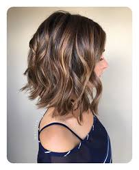 Medium brunette lob with long bangs. 75 Glorious Hairstyles For Thick Hair