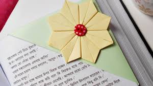 How To Make Beautiful Origami Flower Bookmark Diy Diy Tutorial Guidecentral