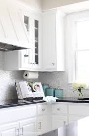 Firmly press the tile sheets into the mortar, making sure it's even and aligned as you do so. How To Install A Mother Of Pearl Tile Backsplash