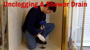 how to clear a clogged shower drain 8