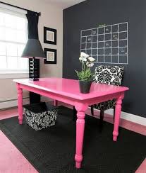 bold pink desk in black home office