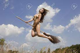 Young Naked Girl Jumping With A Broom Against A Background Of Blue Sky  Stock Photo, Picture and Royalty Free Image. Image 5010489.