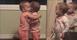 quadruplets cannot stop hugging each