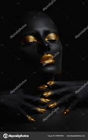 black skin color body art gold makeup