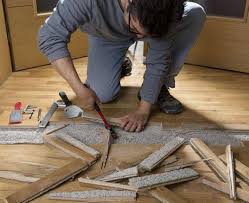how do i fix buckled wood floors how