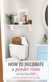 how to decorate a powder room for less