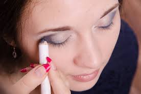 makeup artist brush eyelash tints model
