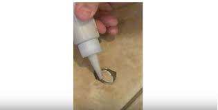 how to fix a chipped tile with grout