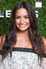 Demi lovato said her new, short hair feels more authentic while appearing on the ellen show. she said that she would hide behind her long hair when she had an eating disorder. Demi Lovato Long Wavy Cut Demi Lovato Hair Lookbook Stylebistro