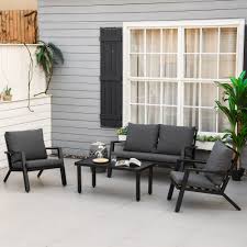 outsunny 4 piece patio furniture set outdoor conversation set with armchairs loveseat coffee table and cushions for backyard grey