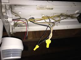 Twist an orange wire connector onto a black house wire inside the switch box, connecting it with a black wire on the motion switch. How Would I Wire A Motion Sensor To A Fluorescent Light Home Improvement Stack Exchange