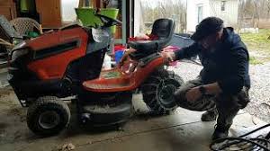 putting tire chains on the lawn tractor