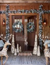 In this living room, sage walls enhance the cool color palette without taking attention away. Pottery Barn Holiday 2017 D4 Snowy Ornament Sage Home Decor Collection Green Wreath