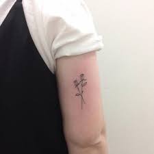 Daisy tattoos can also be a symbol of faith. Daisy Tattoo Back Of Arm Arm Tattoo Sites