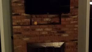 Brick Fireplace With Cutout And Tv