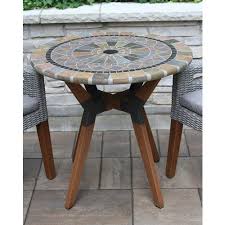 You have 2 decorative chairs and 1 round matching table in this beautiful mosaic bistro set. Outdoor Interiors 30 Sandstone Mosaic Bistro Table