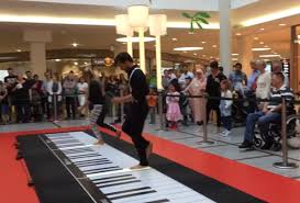 woman joins in on man s piano playing